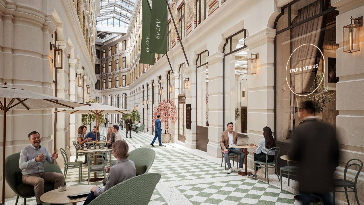 Citypassagen passasje med mann redusert